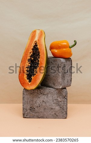 Ripe papaya with cut in half isolated on white background. Clipping path.
