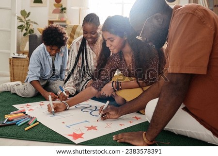 Black Family Drawing Placard for Black History Month Royalty-Free Stock Photo #2383578391