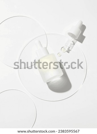 Transparent skin care products essence dropper utensils Scientific skin care Royalty-Free Stock Photo #2383595567