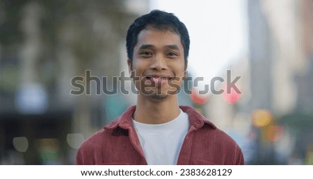 Young Asian Filipino man smile happy face portrait
 Royalty-Free Stock Photo #2383628129