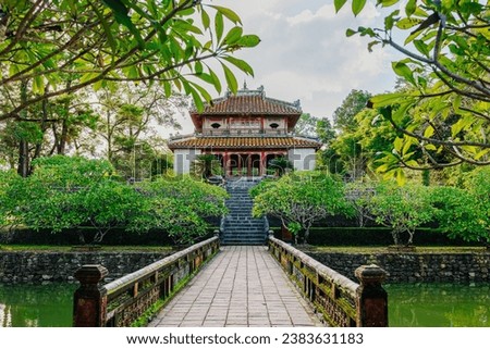 Minh Lau pavilion and Trung Dao bridge at Minh Mang Emperor Tomb, Hue, Vietnam  Royalty-Free Stock Photo #2383631183
