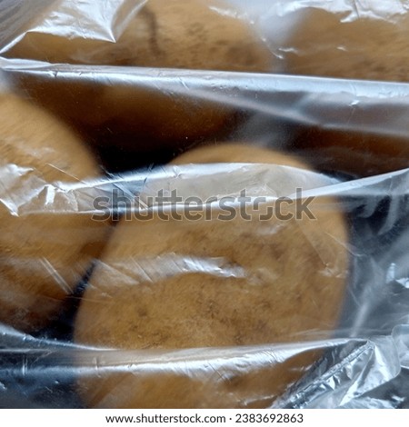 photo of potatoes in plastic