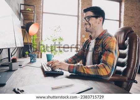 Profile photo of successful intelligent front end developer sit chair keyboard write script code bright modern office inside