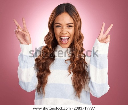 Portrait of happy woman, smile on face and peace sign hands, happy lifestyle celebration on pink background. Happiness, freedom and excited girl in studio with winning hand gesture, v symbol or emoji
