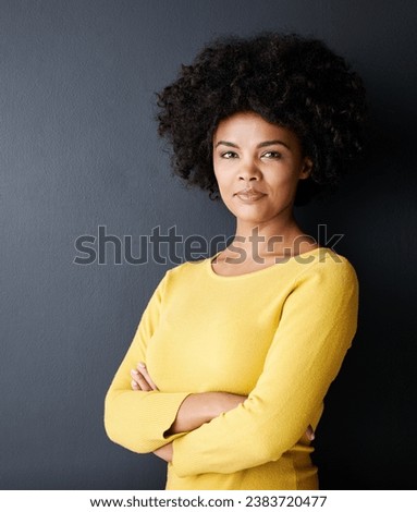 Black woman, confidence and portrait with arms crossed for fashion, style and pride in identity. Natural, hair and beauty with African model in studio, mockup space or person in gray background