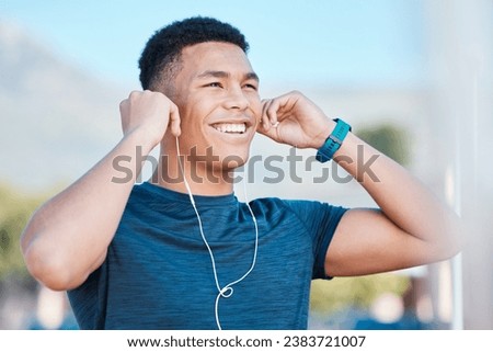 Music, fitness and man thinking of running, exercise, and workout in the city of Brazil. Motivation, ready and young runner listening to a podcast, audio or radio to start training in the morning