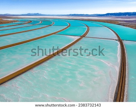 Aerial view of lithium fields or evaporation ponds in the highlands of northern Argentina, South America - a surreal, colorful landscape where batteries are born