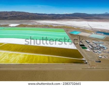 Aerial view of lithium fields or evaporation ponds in the highlands of northern Argentina, South America - a surreal, colorful landscape where batteries are born Royalty-Free Stock Photo #2383732661