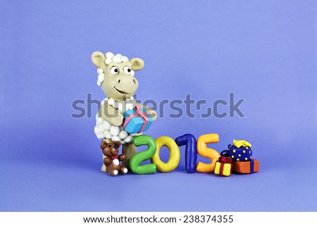 Clay sheep with gifts and numbers 2015