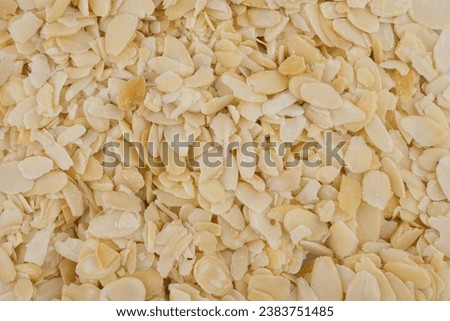 almond slices isolated on white background Royalty-Free Stock Photo #2383751485
