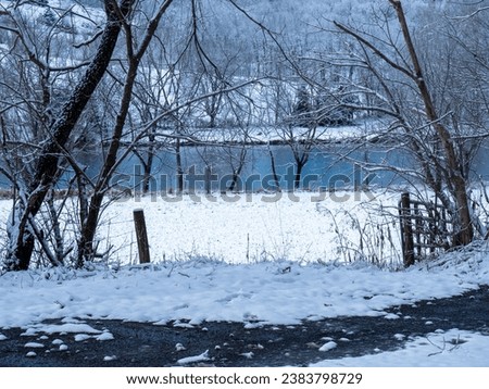 Various photos taken at Shot Tower Park along I77 and New River in Virginia after a snow flurry. Cool color temperature.