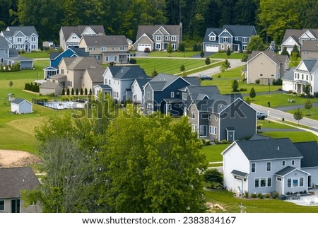 Housing market in the USA. Residential homes in suburban sprawl development in Rochester, New York. Low-density two story private houses in rural suburbs