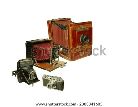 Set of vintage collectible cameras shooting on film and photographic plates.Isolated on white.