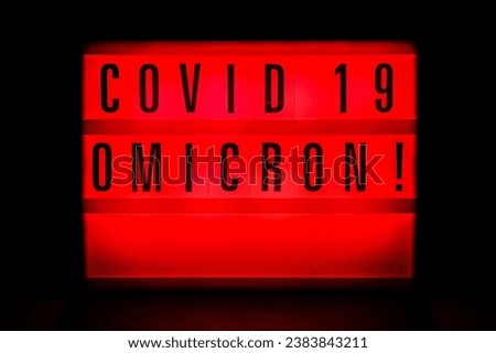 Sign with an inscription Covid 19 Omicron. Covid 19 Pandemic. Selective focus. High quality photo