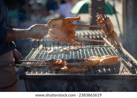 If I want simple cooking pictures In Thailand, street food is plentiful. This picture shows a vendor making delicious grilled street chicken one morning. And it was very delicious.