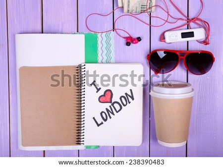 Travel things for traveling on wooden background top view