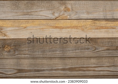 Background from wooden boards. Wooden background. Wooden boards of different shades. Wooden boards in full screen.