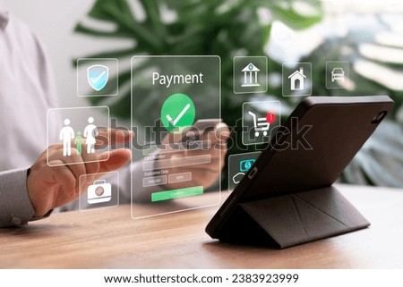 Digital banking Secure online payments concept, Businessman use tablets for financial transactions, Online shopping, Health, insurance, Home and car instalment to Payment via mobile banking apps Royalty-Free Stock Photo #2383923999