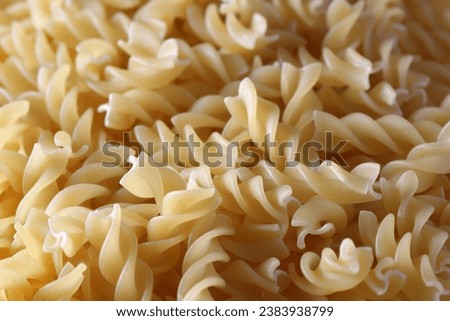 Close up image of beige lentil fusilli pasta
