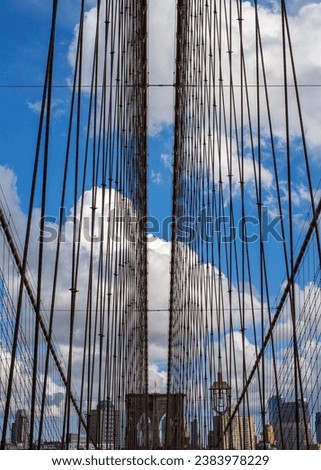 A stunning stock photo of the iconic Brooklyn Bridge, one of New York City's most popular tourist destinations.