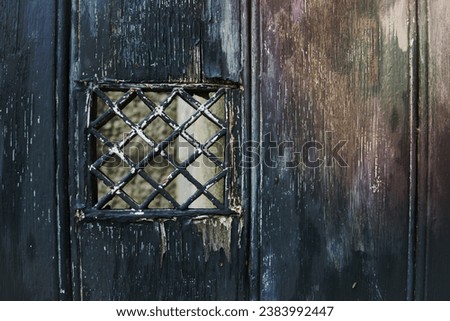 Emerald shabby door Cracked weathered wooden board texture Royalty-Free Stock Photo #2383992447