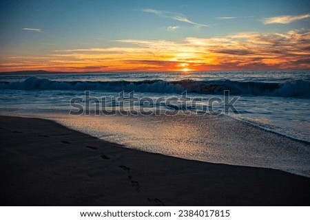 Colorful sunset on the Monterey Bay in the Fall. Royalty-Free Stock Photo #2384017815