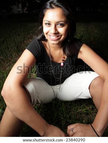 Woman smiling and sitting