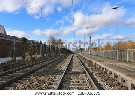 railway train platform in the autumn season