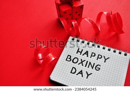 red happy boxing day background - write next to box 