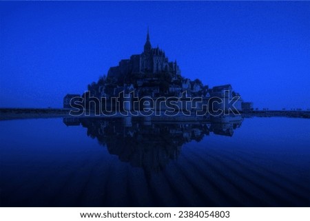 Mont-Saint-Michel with blue photo filter, JPG super-high quality image Royalty-Free Stock Photo #2384054803