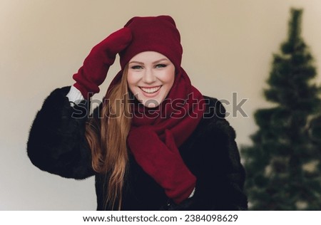 Photo of self assured Arabian lady in hijab, shows you right way, points at blank space with both fore fingers, invites going there, promots copy space. Check it out with me