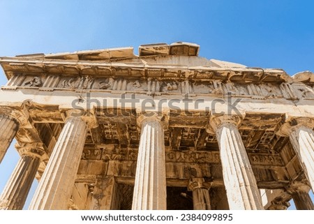 The Temple of Hephaestus (Hephaisteion, "Hephesteum" or "Hephaesteum") - ancient Greek temple on Agora of Athens with Doric colonnade Royalty-Free Stock Photo #2384099895
