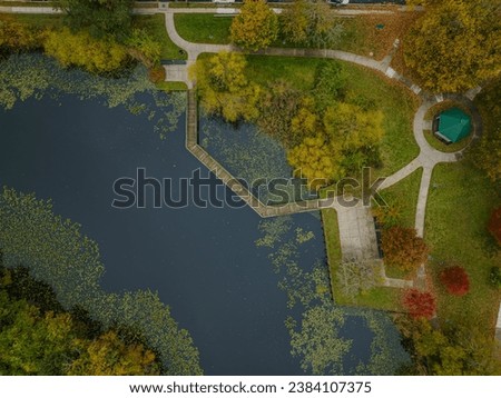 Top down shot over Lofts Pond on Long Island, NY in autumn on a cloudy day.