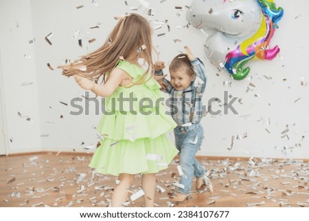 Confetti rain on a girls birthday Royalty-Free Stock Photo #2384107677