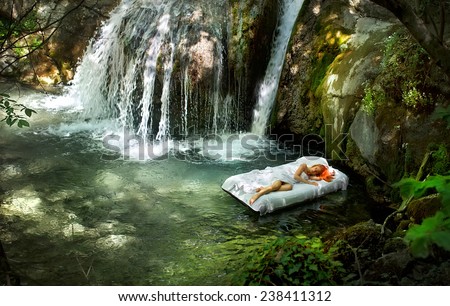  Sleeping woman in deep forest with waterfall on back
