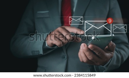 Businessman checking email on the phone screen. New email notification concept for business email communication and digital marketing. Inbox receives notification of electronic messages. Royalty-Free Stock Photo #2384115849