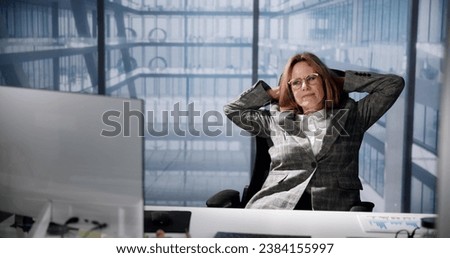 Relaxed Woman Taking a Breath, Using an Office Chair