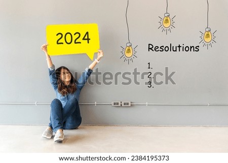 2024 resolutions with young woman cheerful and happy new year.  Star together new year 2024  
 Royalty-Free Stock Photo #2384195373