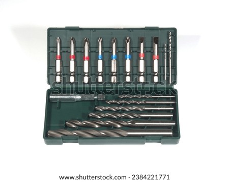 8 screw bits and 8 HSS drill bits in a practical storage box. Accessories for drilling machines. Construction and hobbies. High quality metal screwdriver bits