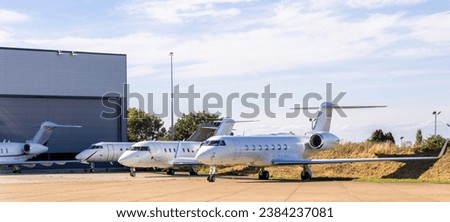 A luxury private jet to take business people or wealthy people quickly across the world. Royalty-Free Stock Photo #2384237081