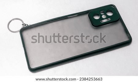 Elegant Mobile Phone Accessories, white background. taken at a high angle