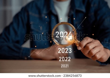 businessman new year business goals 2024, positive indicators 2024 , Planning and challenge strategy business in new year  Concept . Royalty-Free Stock Photo #2384256873