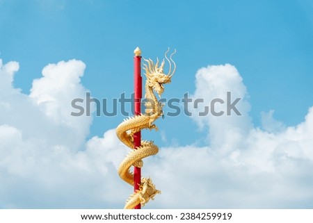 Dragon god, dragon statue on a red pole, Chinese god, Chinese New Year, golden dragon