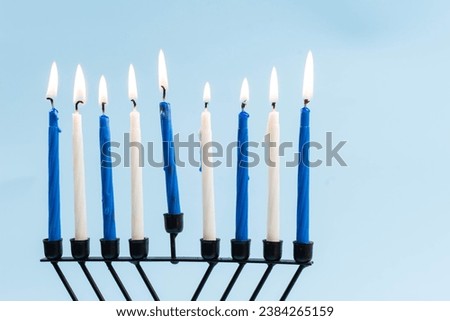 Jewish holiday Hanukkah concept. Menorah – traditional candelabrum or hanukkiah with burning candles. Royalty-Free Stock Photo #2384265159