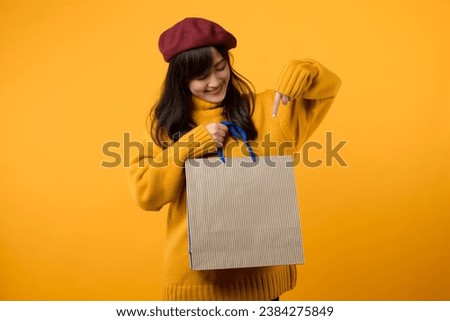 Shop till you drop! A fashion-forward shopper in a red beret and yellow sweater explores amazing deals against a lively yellow backdrop.