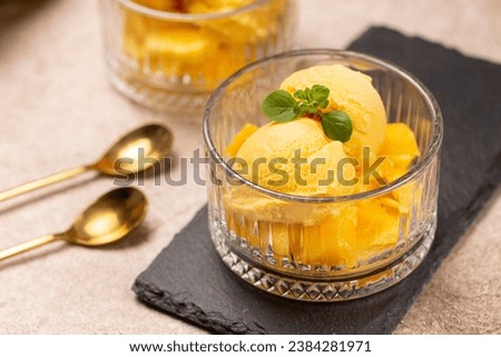 Natural mango ice cream in glass cremans