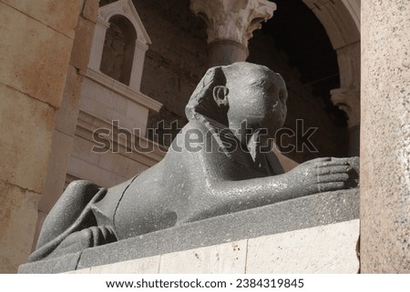 Beautiful View Of Old Split Town With Historical Figure Of Sphinx. Entrance To The Cathedral St. Duje. Peristil Square, Croatia. Royalty-Free Stock Photo #2384319845