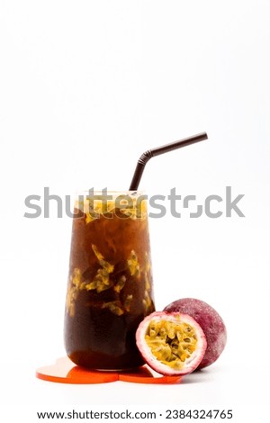 Passion fruit coffee ,fresh juice on a wooden background Royalty-Free Stock Photo #2384324765