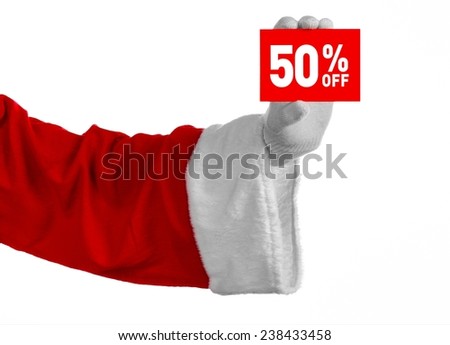 Christmas and New Year discounts topic: Santa's hand holding a red card for a 50 percent  discount on an isolated white background
