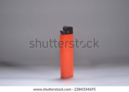 Gas matches or colorful lighters on a white background